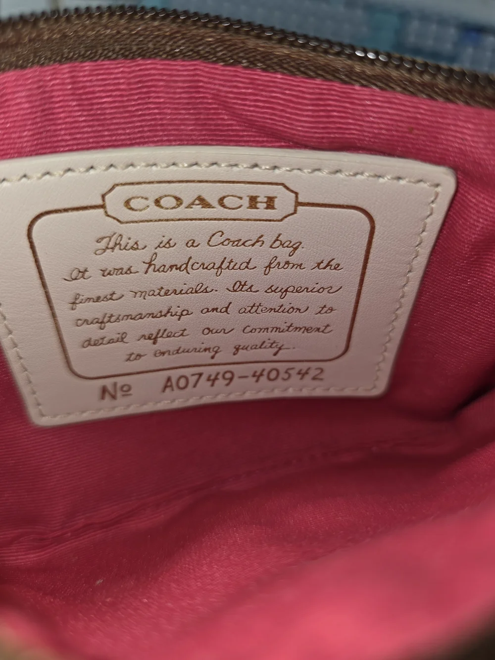 Coach Brown Signature Wristlet with Multicolor Stripe Accent